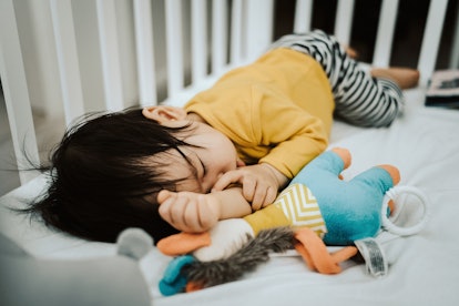 Thumb sucking toddler sleeping, toddler keeps taking diaper off at night