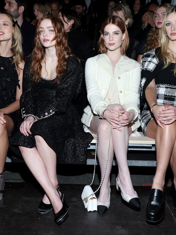 (L-R) Angèle, Sadie Sink, Lucy Boynton, and Apple Martin attend the Chanel Haute Couture Spring Summ...
