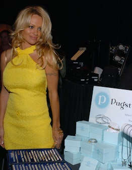 Pamela Anderson made a custom Italian charm bracelet at the 2005 Billboard Music Awards.