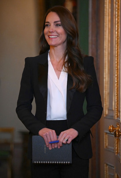 Kate Middleton wearing a black Alexander McQueen blazer