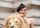Kylie Jenner wears lion head dress at Schiaparelli show during the Paris Fashion Week 2023