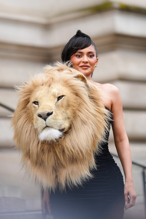 Kylie Jenner wears lion head dress at Schiaparelli show during the Paris Fashion Week 2023