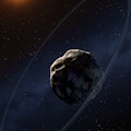 Chariklo, discovered in 1997, is an asteroid of the Centaur variety, exhibiting characteristics of b...