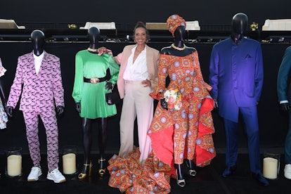 Michelle Cole poses with her Emmy-nominated costumes for black-ish