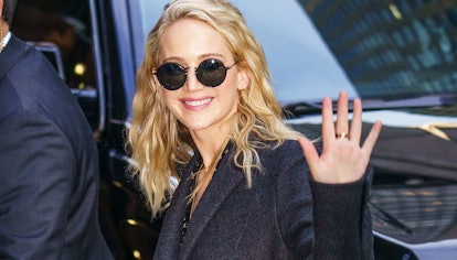 Jennifer Lawrence wearing a gray wool coat.