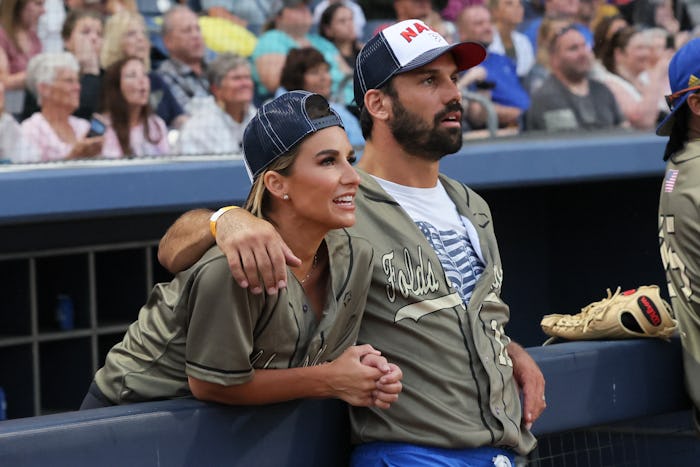 Jessie James Decker and her husband, Eric Decker, at a sports game. Jessie says her husband won't ge...