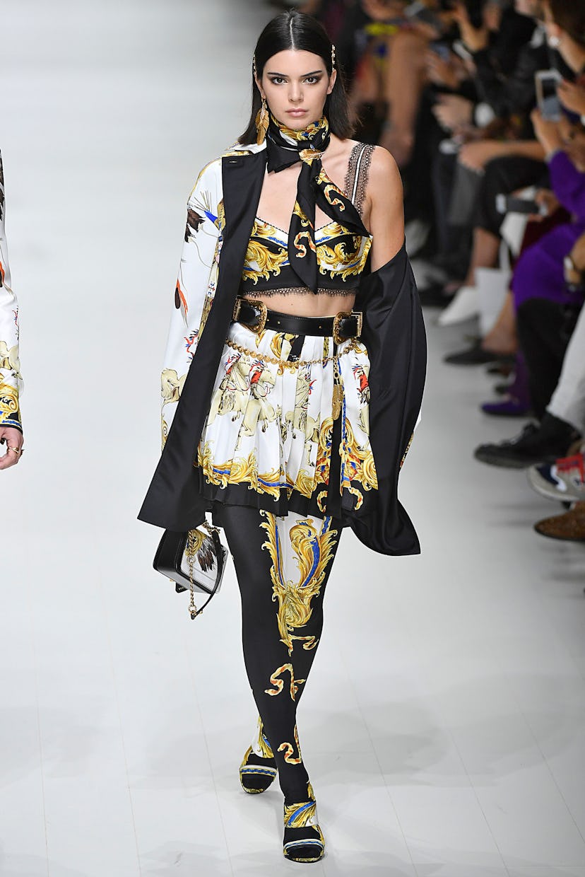 Kendall Jenner walks the runway at the Versace Ready to Wear Spring/Summer 2018 fashion show during ...