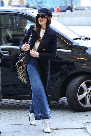 Anne Hathaway is seen during Paris Fashion Week 