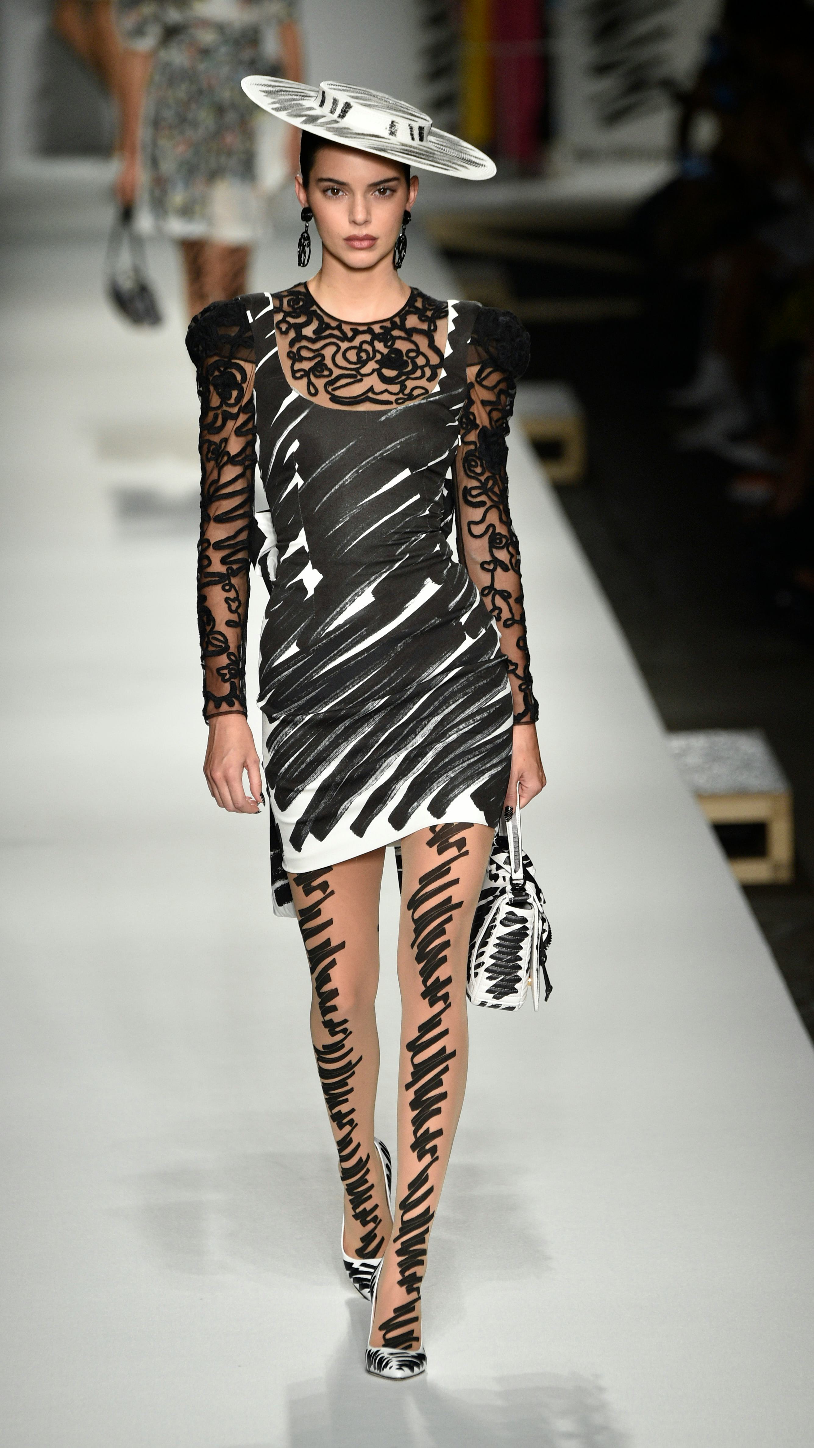 Kendall Jenner walks the runway at the Moschino show during Milan Fashion Week Spring/Summer 2019 on&hellip;
