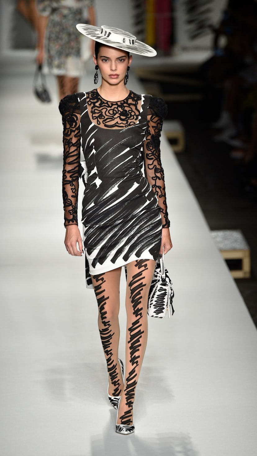 Kendall Jenner walks the runway at the Moschino show during Milan Fashion Week Spring/Summer 2019 on…