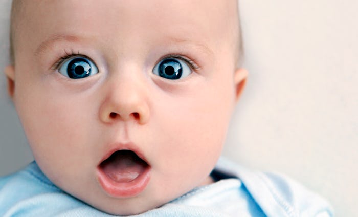 closeup of blue-eyed baby boy for article on boy names that start with z