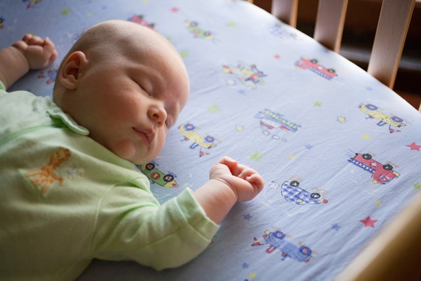 baby sleeping safely on their back in a crib in an article about people who wonder why babies sleep ...