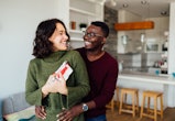 Happy young interracial couple having fun at home for article on best valentine's day gifts for her