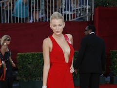 Blake Lively attends the 61st Primetime Emmy Awards at the NOKIA Theatre. Lively wears Versace with ...