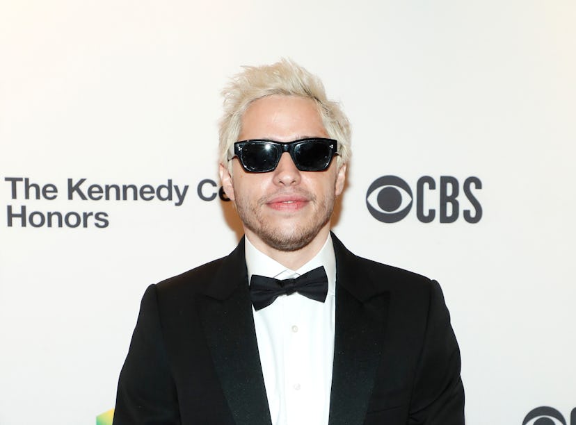 Photos of Pete Davidson's Hawaiian vacation with Chase Sui Wonders show them kissing.