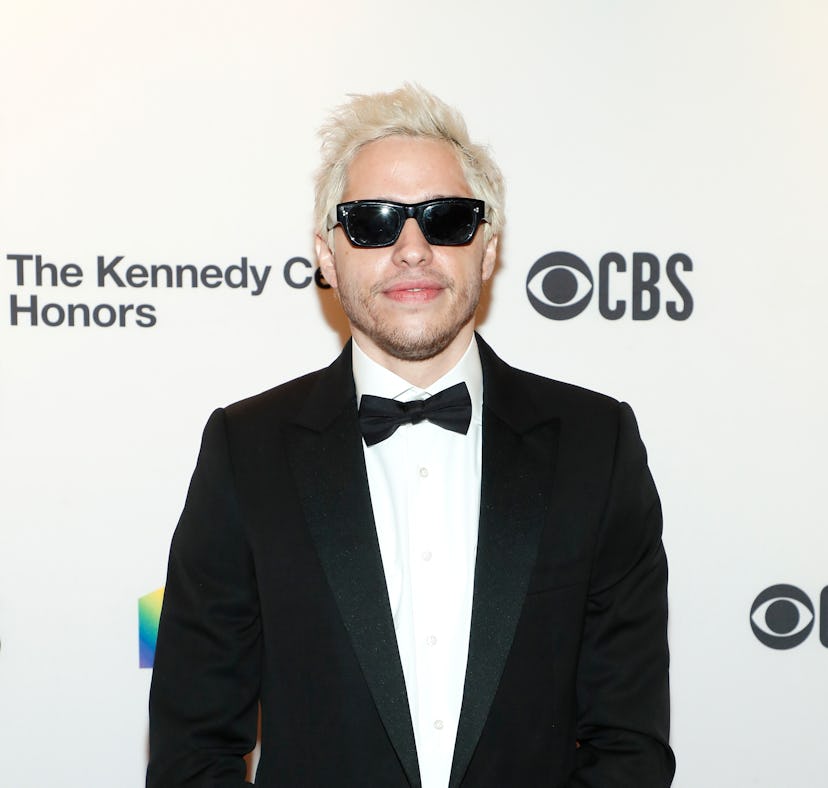 Photos of Pete Davidson's Hawaiian vacation with Chase Sui Wonders show them kissing.