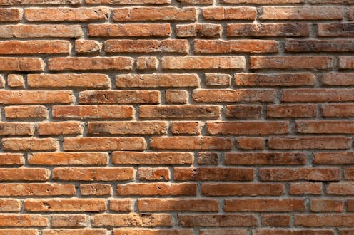 Brick wall concrete texture as a background.