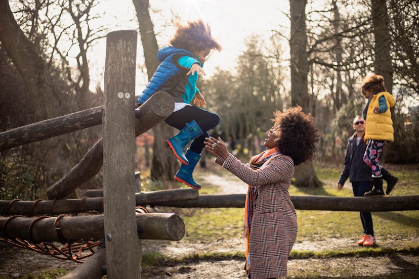 Playing outdoors together is a great family tradition.
