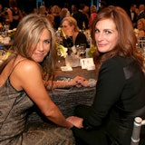 Jennifer Aniston (L) and Julia Roberts attend TNT's 21st Annual Screen Actors Guild Awards 