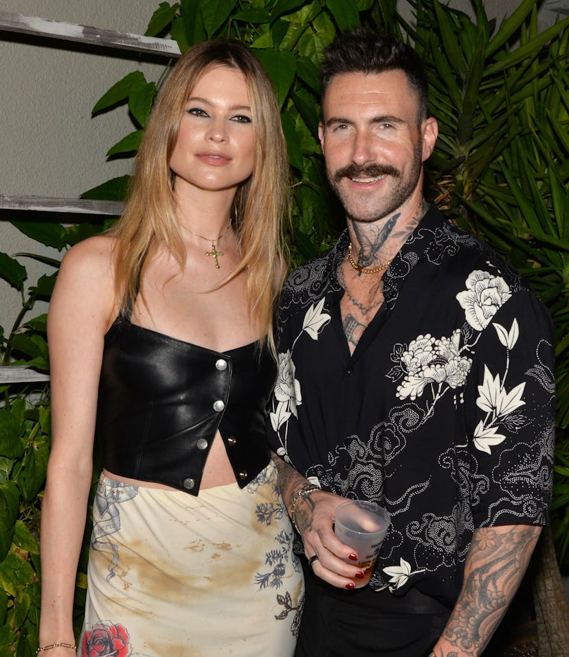 MIAMI BEACH, FL - FEBRUARY 24: Behati Prinsloo and Adam Levine at the Calirosa Tequila Sunset Happy ...