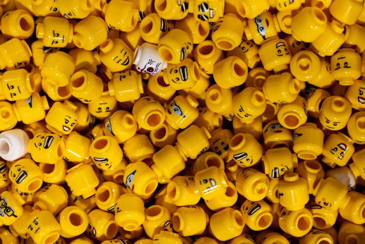 27 September 2022, Bavaria, Munich: Various heads of Lego figures are seen at a press event in the c...