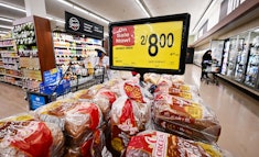 People shop at a supermarket in Montebello, California, on August 23, 2022. - US shoppers are facing...