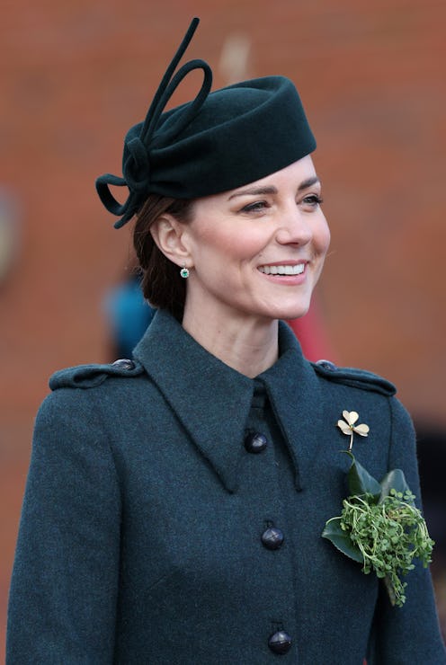 Kate Middleton wearing an forest green coat by Laura Green.