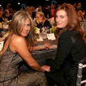 Actresses Jennifer Aniston (L) and Julia Roberts attend TNT's 21st Annual Screen Actors Guild Awards...