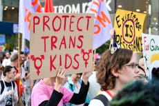Placard saying, Protect the Trans kids, during the Trans march. Spectators displayed their support t...