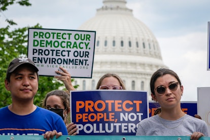 Environmental activists rally near the U.S. Capitol on July 6, 2022, in Washington, D.C., to protest...