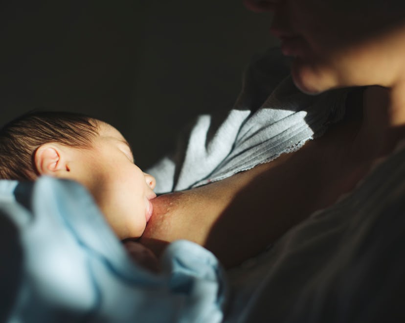 baby nursing in an article about can i eat spicy food while breastfeeding