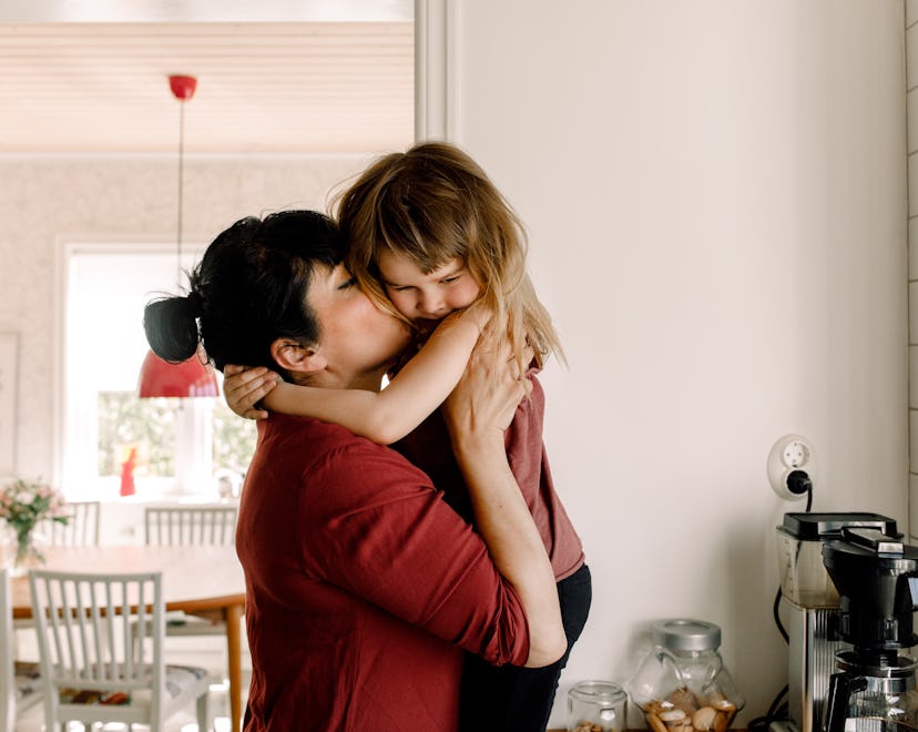 mom soothing child in an article about how to deal with a child that cries over everything