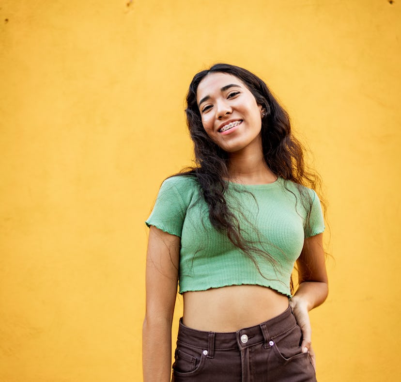 A happy woman may want to know what the lucky girl syndrome from TikTok is.