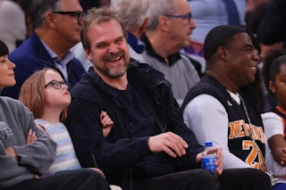 Actor David Harbour attends the game between the New York Knicks and the Dallas Mavericks at Madison...