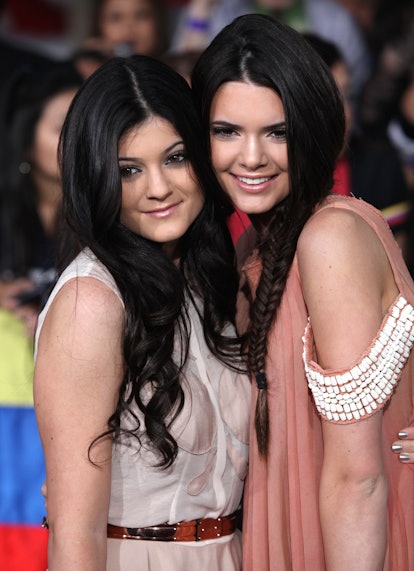 Kendall Jenner fishtail braid and Kylie Jenner with long curly hair as teenagers at the premiere Of ...