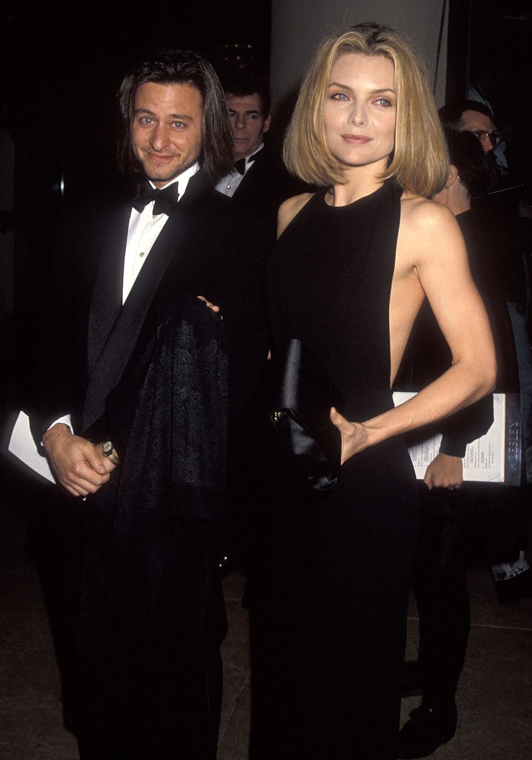 Fisher Stevens and actress Michelle Pfeiffer attend the 49th Annual Golden Globe Awards 