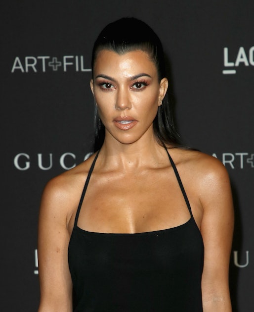 Kourtney Kardashian Is Serving Booty In A Striped Cut-Out Dress