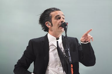 READING, ENGLAND - AUGUST 28: (EDITORIAL USE ONLY) Matty Healy of The 1975 performs on the main stag...