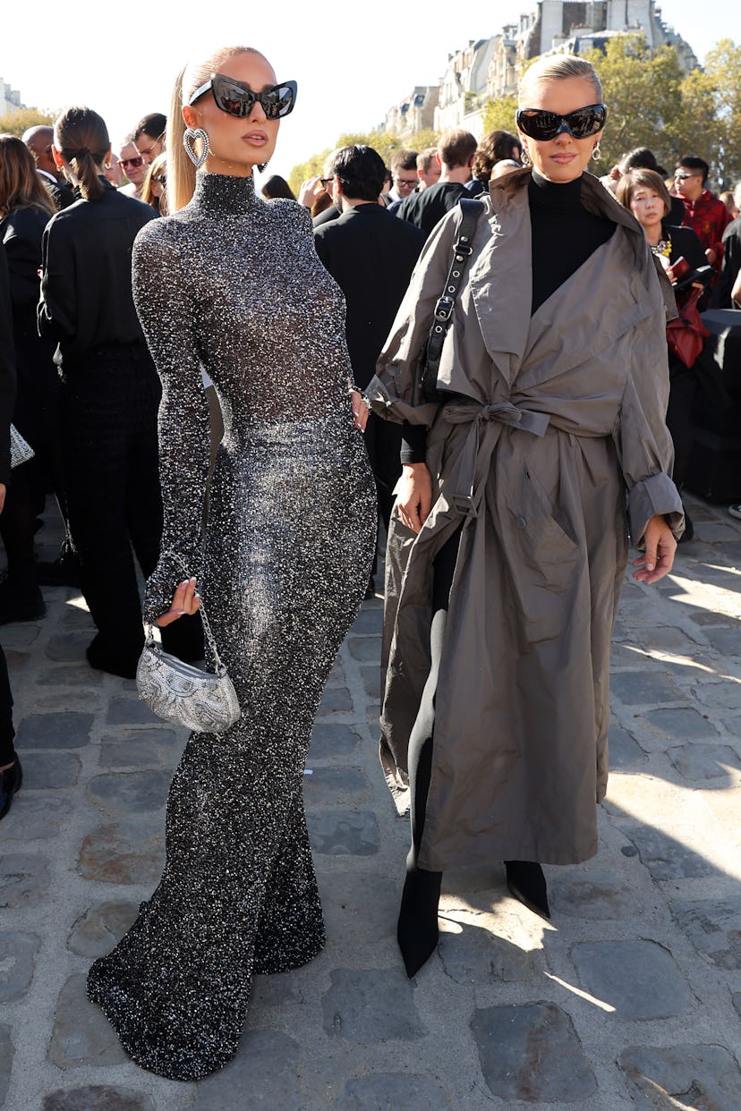 PARIS, FRANCE - OCTOBER 01: Paris Hilton and Nicky Hilton attend the Balenciaga Womenswear Spring/Su...