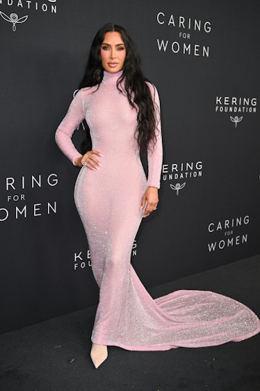 Kim Kardashian in yellow Versace mini dress on August 15