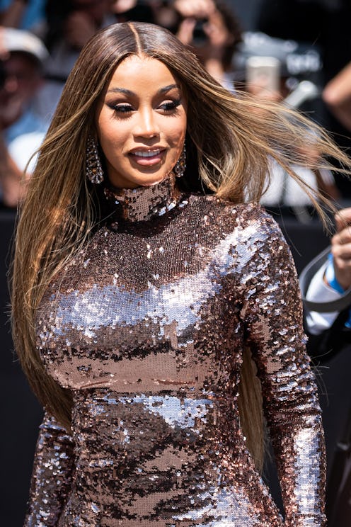 Cardi B long straight hair and sequin dress