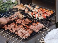 Preparation of Chicken, Meat and Vegetable Kebab on grill