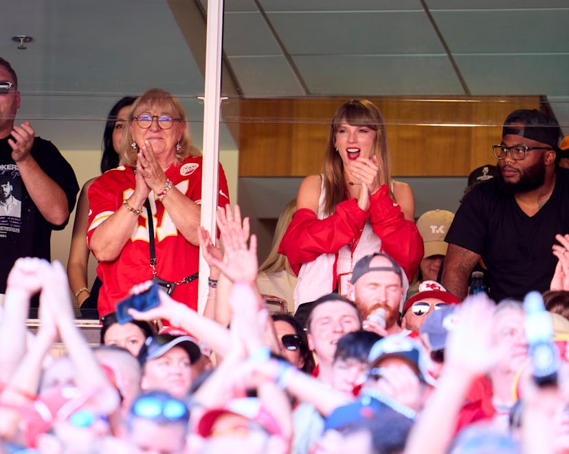 KANSAS CITY, MO - SEPTEMBER 24: Taylor Swift cheers from a suite with Donna Kelce as the Kansas City...