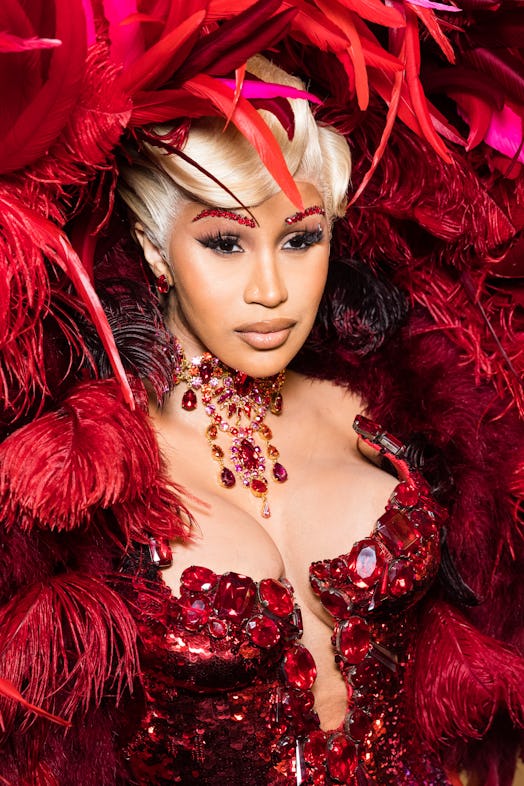 Cardi B blonde with sequin eyebrows for Paris fashion week