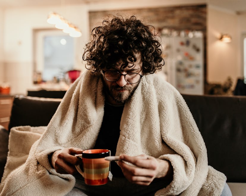 young man sick at home