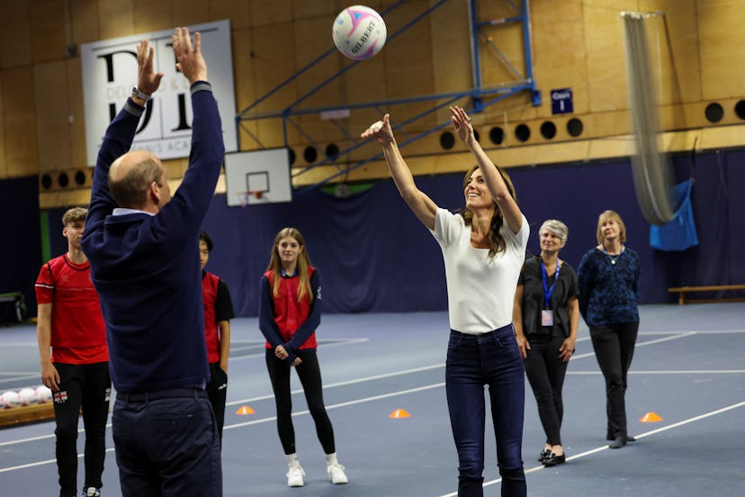 MARLOW, ENGLAND - OCTOBER 12: Britain's Prince William and Catherine, Princess of Wales play netball...