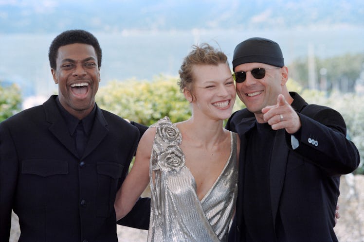 From left, US actor Chris Tucker, Ukrainian actress Milla Jovovich and US actor Bruce Willis pose fo...