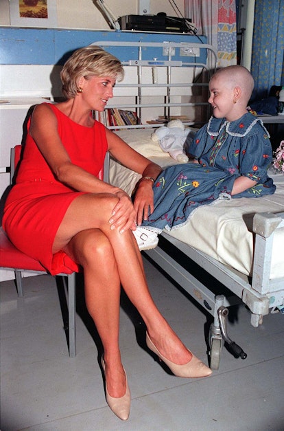 Diana, Princess of Wales meets Hollie Ann Robinson Marsh, who has lost her hair as a result of chemo...