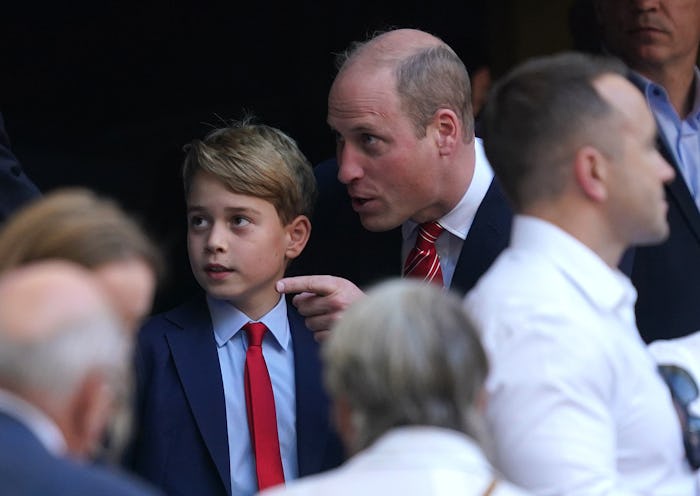 The Prince of Wales and Prince George (left) in the stands ahead of the Rugby World Cup 2023 quarter...