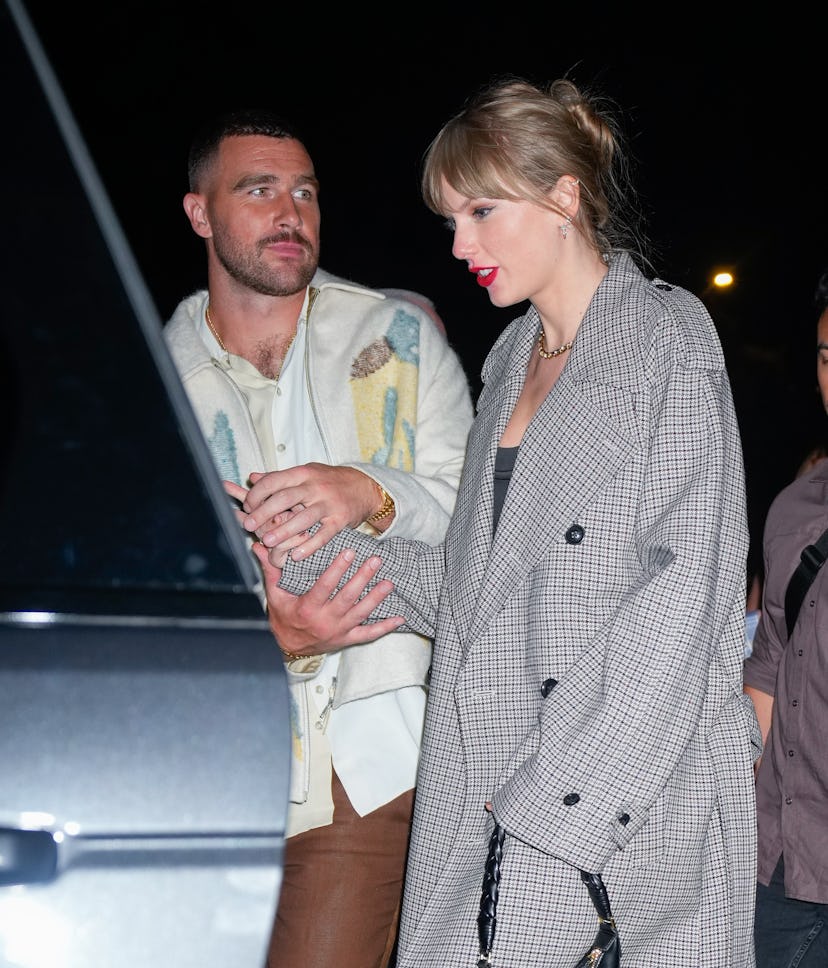  ravis Kelce and Taylor Swift depart the SNL Afterparty on October 15, 2023 in New York City.